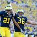 Michigan wide receiver Roy Roundtree celebrates with fullback Joe Kerridge after Roundtree's touchdown in the third quarter at Michigan Stadium on Saturday. Melanie Maxwell I AnnArbor.com